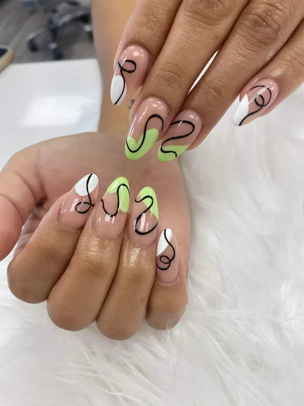 Minimalist black and neon green abstract nail art from Nail Shadow.